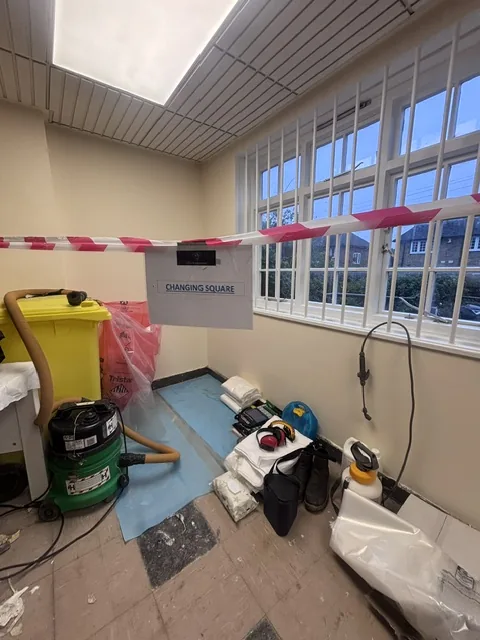 Asbestos floor tile and bitumen removal in Hackney